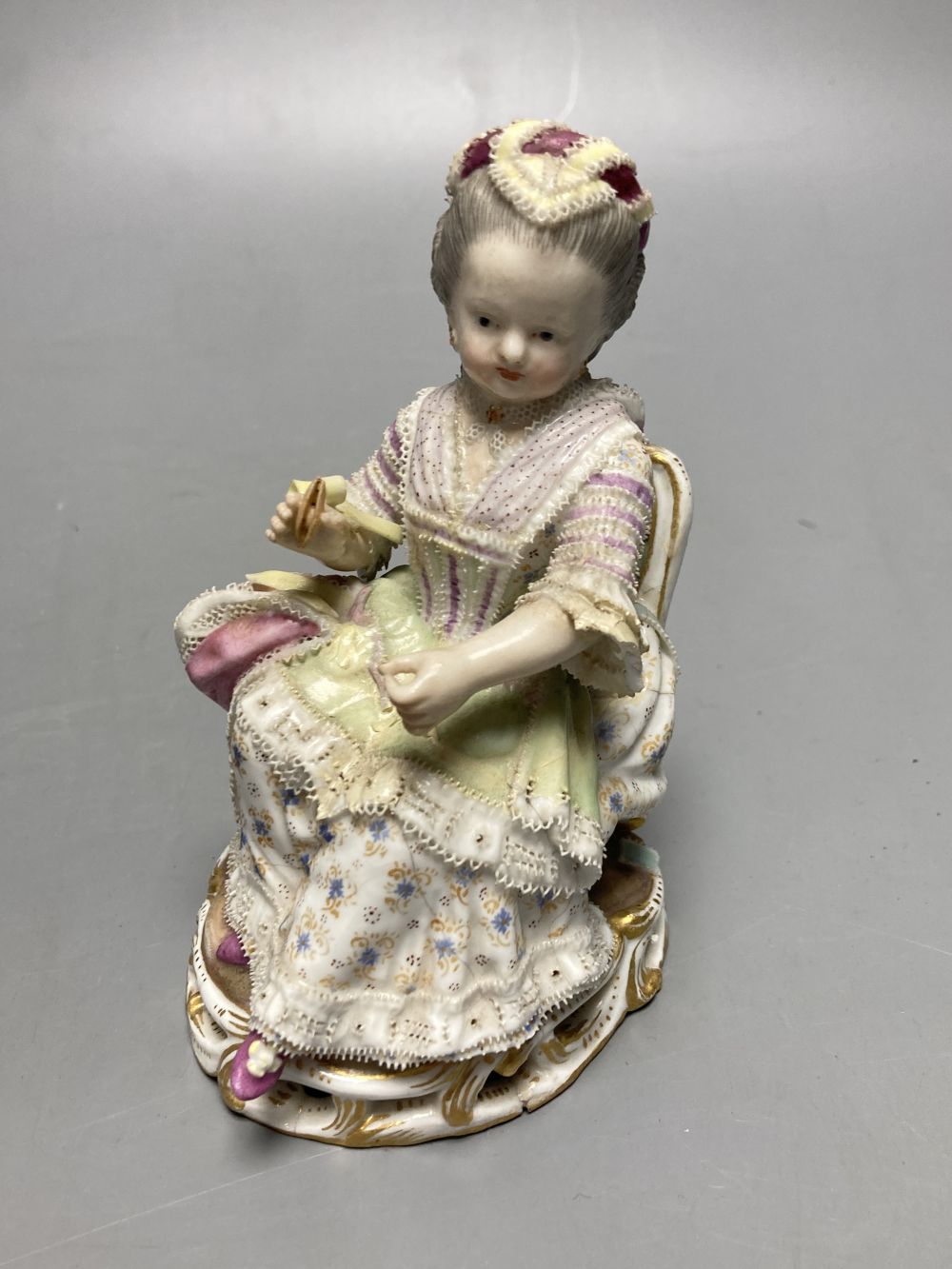 A pair of Meissen figures in 18th century dress, height 13cm